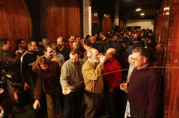 Basque drinkers in a cider house. Johnny Appleseed would approve